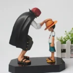 Figura di Luffy e Shanks