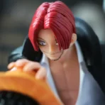 Figura di Luffy e Shanks
